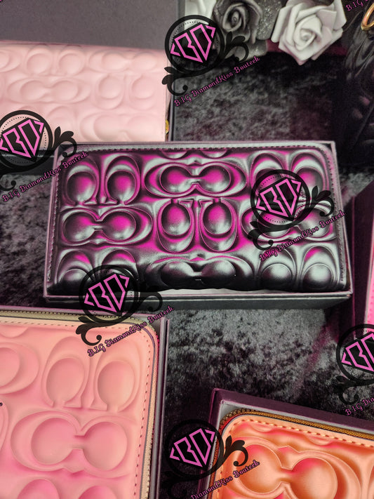 Embossed C Wallets